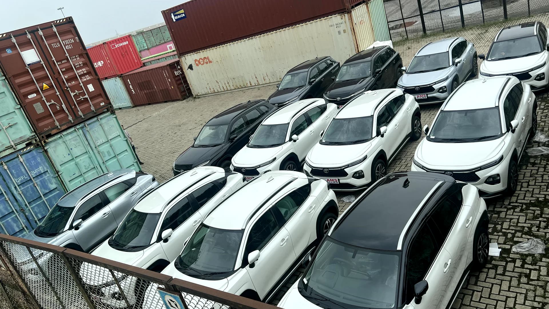 A fleet of new vehicles parked at the export yard