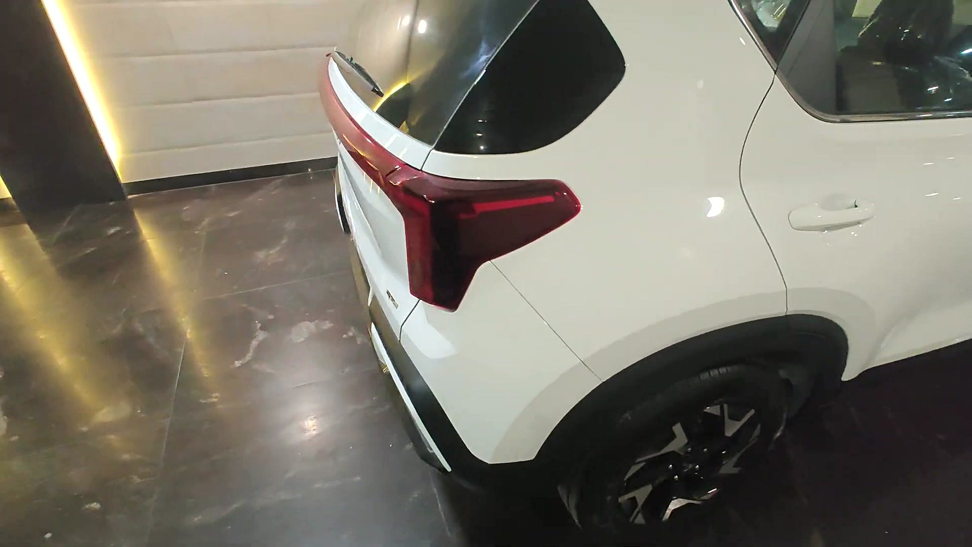 Rear three-quarter — white unit
