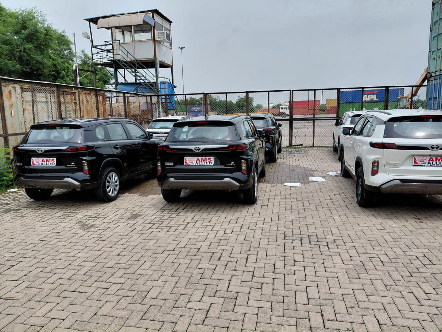 Fleet yard — black and white units