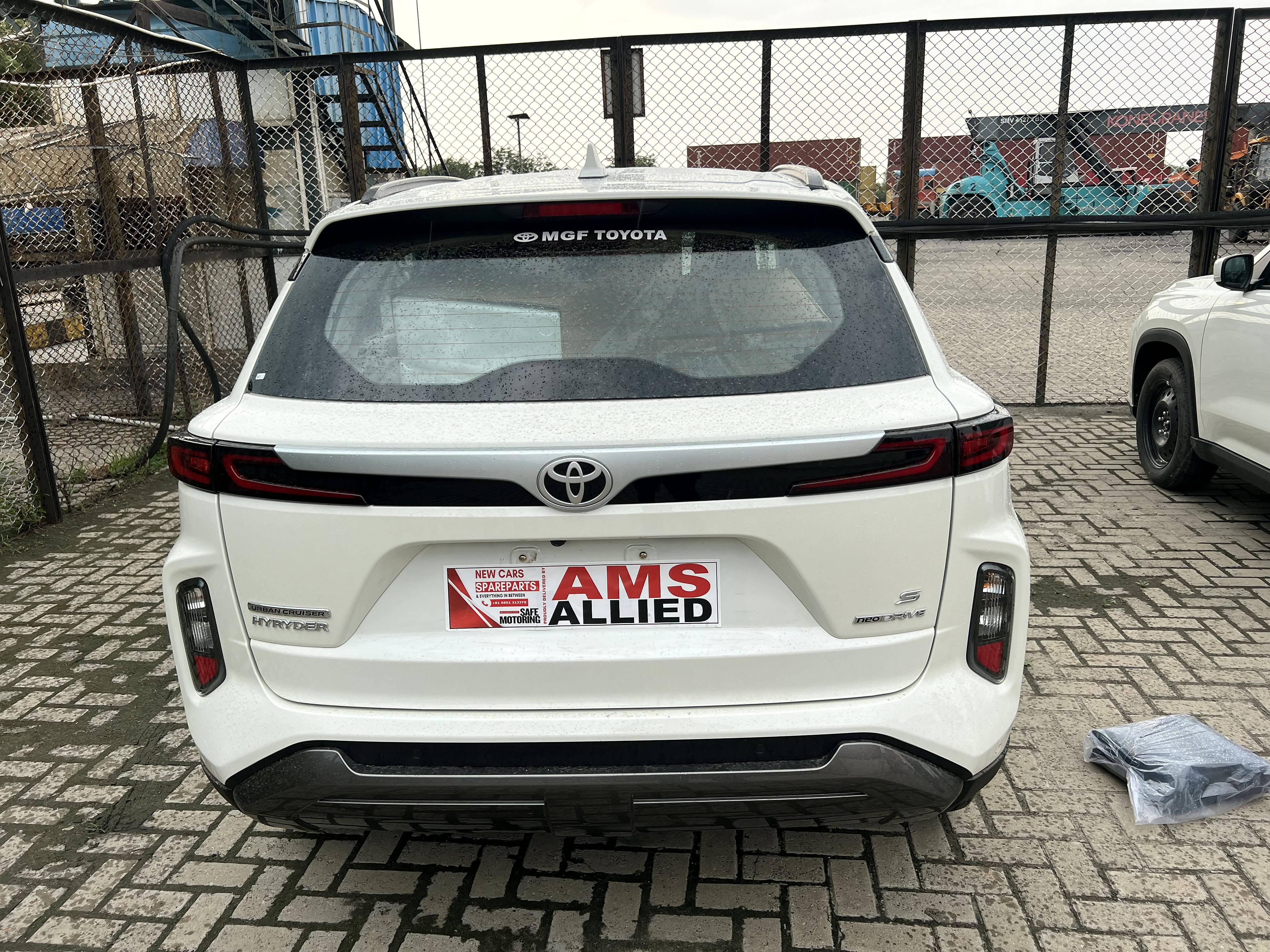 Rear with dealer plate — white unit